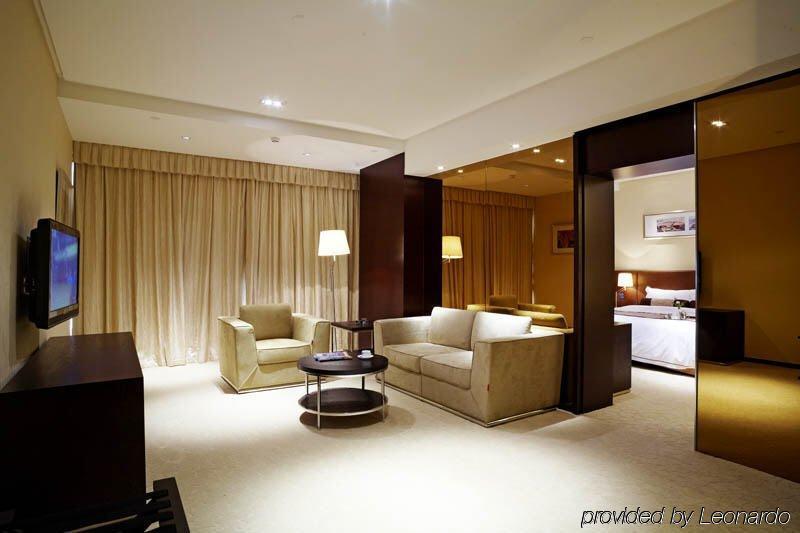 Jiazheng International Energy Hotel Huacsiao Szoba fotó